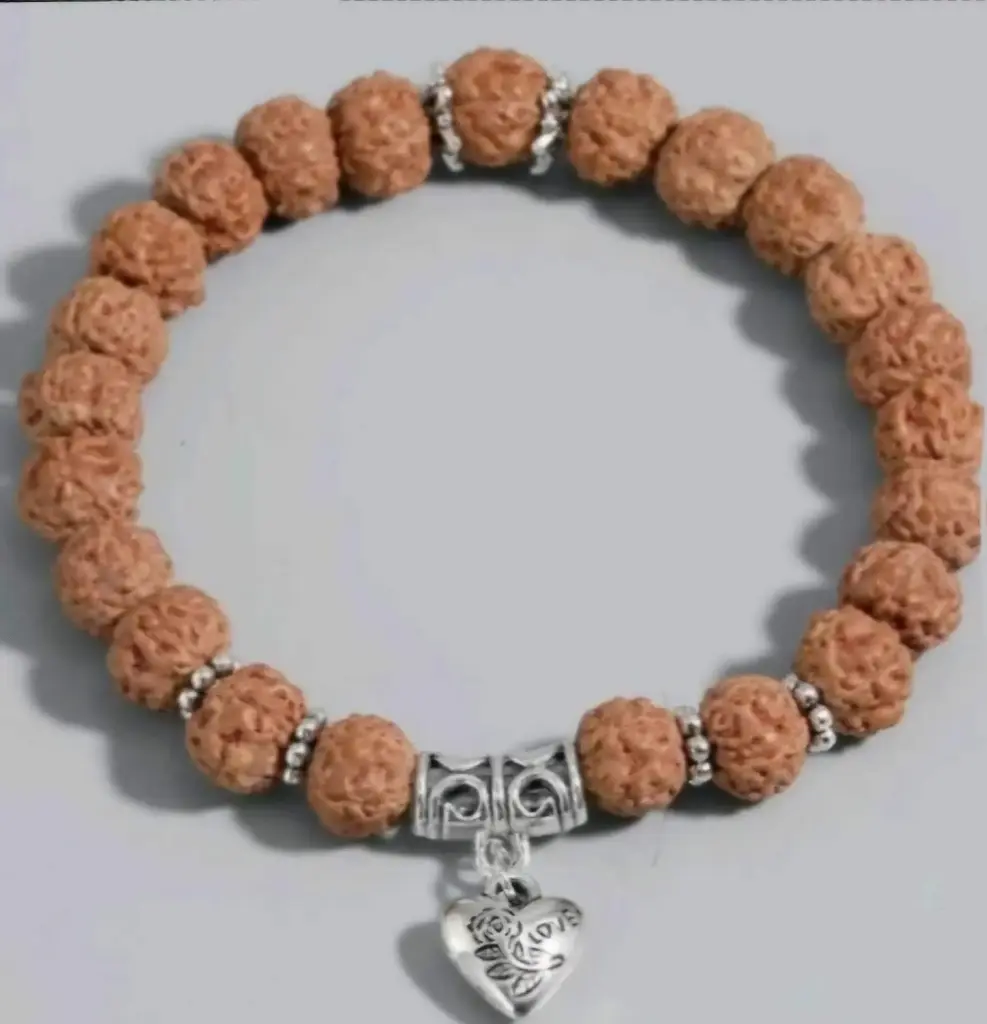 Bracelet "Porte bonheur & protection" graine rudraksha